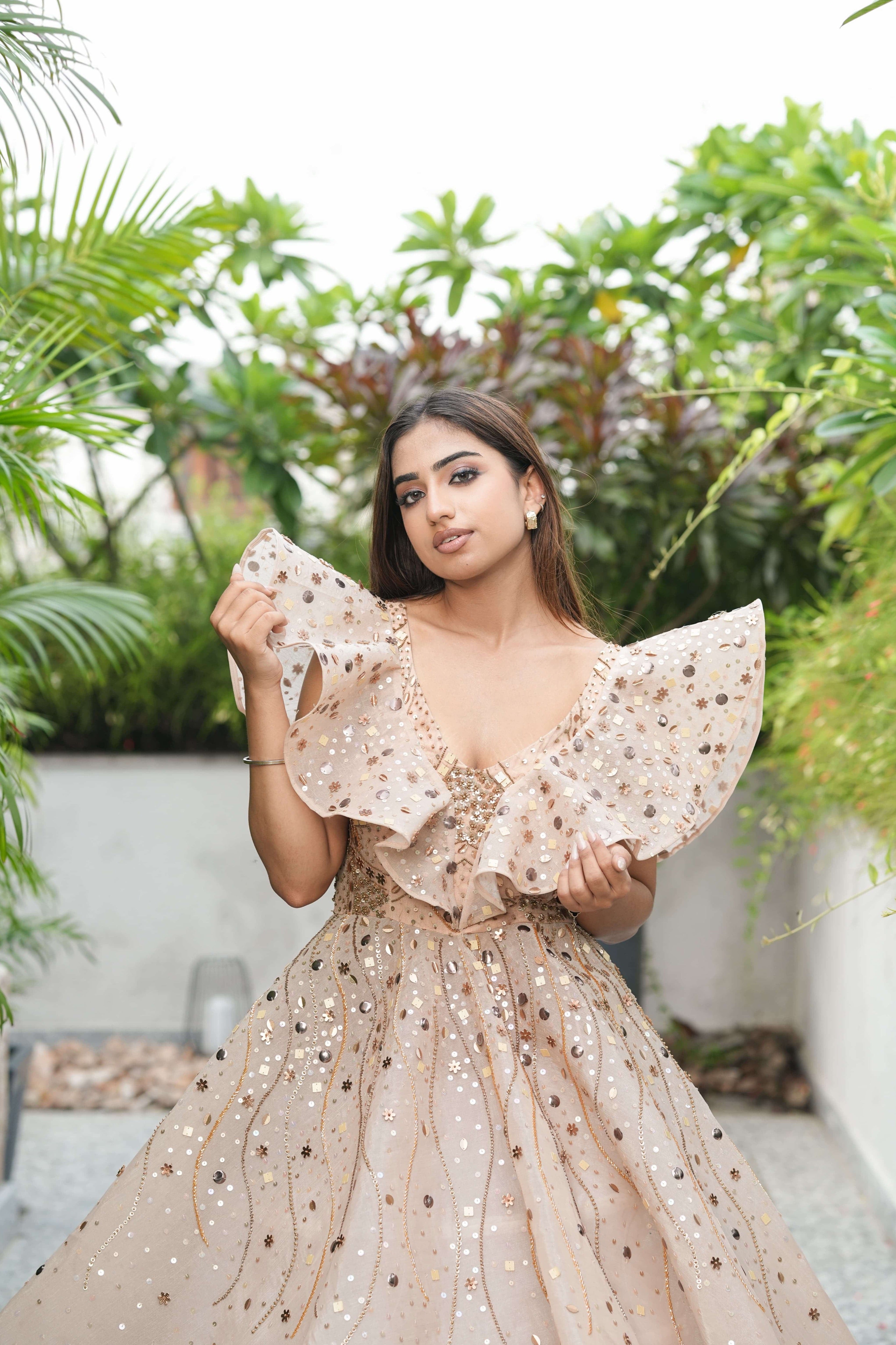 Rose Gold Sequin Ruffle Gown