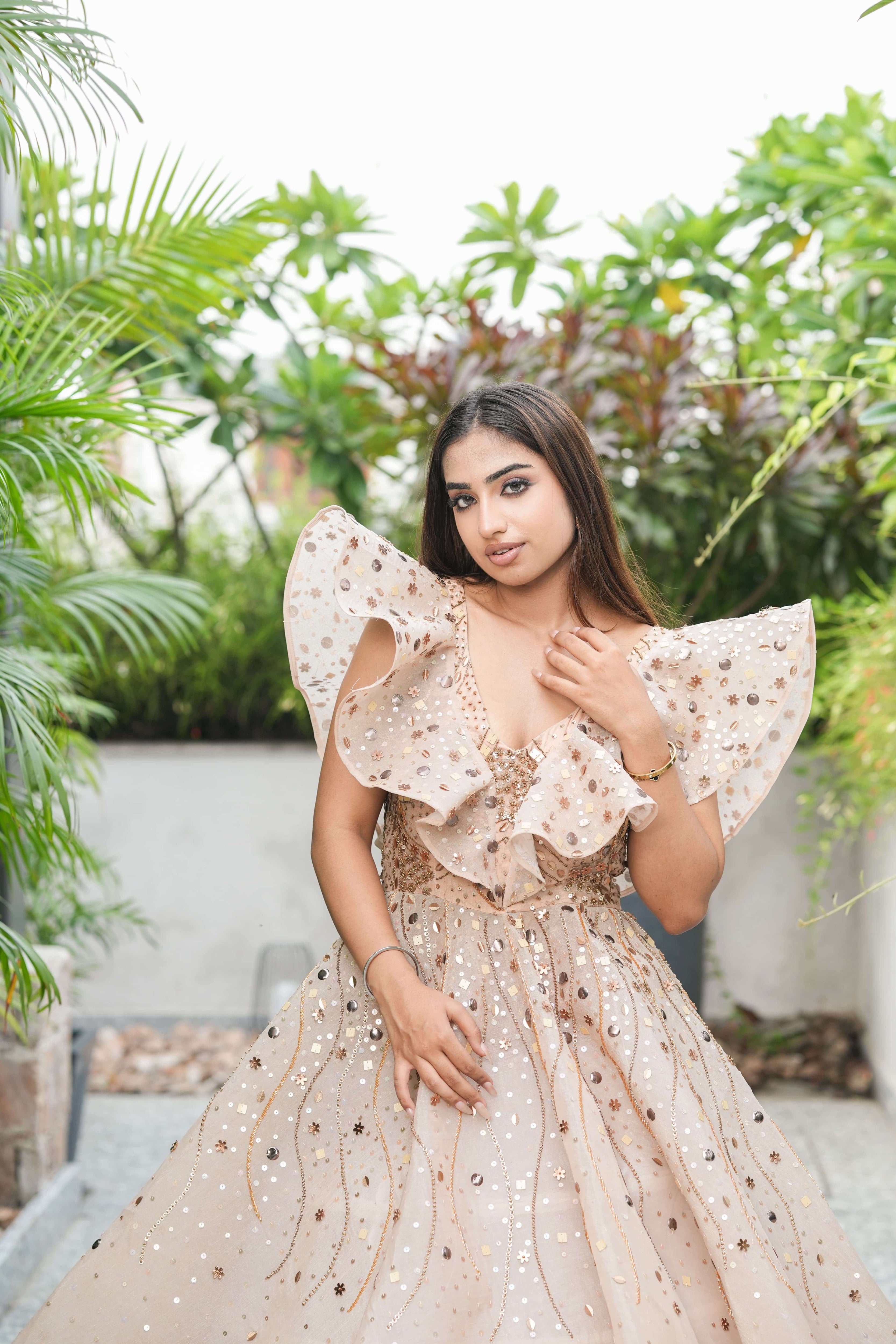 Rose Gold Sequin Ruffle Gown